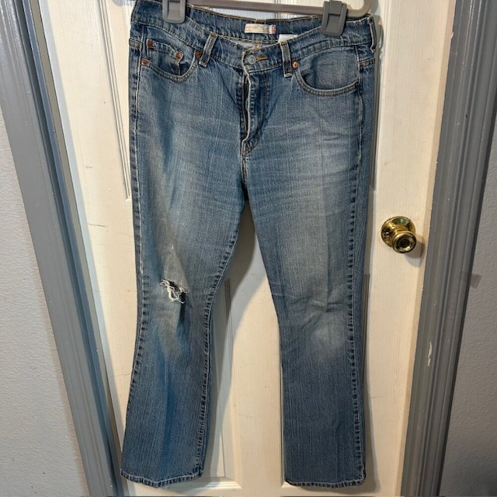 Levi’s 515 Bootcut Jeans Size 12M Medium Wash Distressed Knee Hole Well Worn